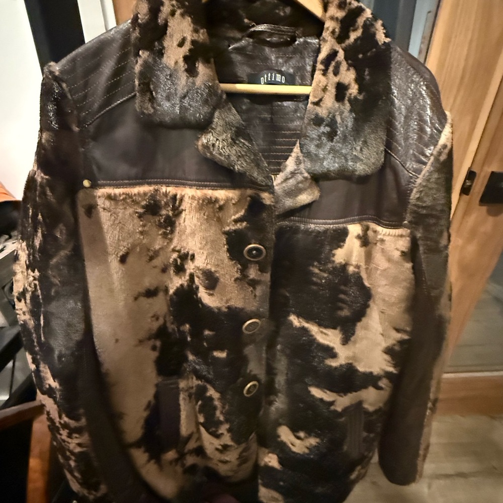 Luxurious brown/tan leather cow mink jacket. Brand new, comfy, super warm.